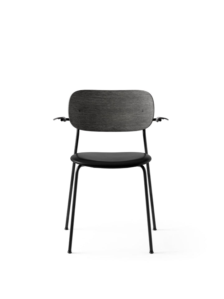 Co Dining Chair, upholstered seat with armrest, Black Frame by Audo Copenhagen - Drawing on The Office Group’s extensive knowledge of workplace needs, the Co Chair pairs a lightweight, sleek profile with great seating comfort – and the option to stack up