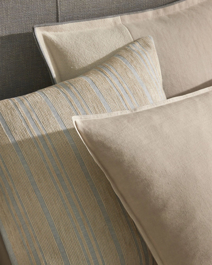 Adriana Glacier A woven mix of lustrous chenille and dry natural fibres gives Adriana a chic finish and luxe feel. A palette that heros modern, essential, on-trend hues. Glacier combines sky blue with a contrasting sandstone stripe.Timeless and classic in