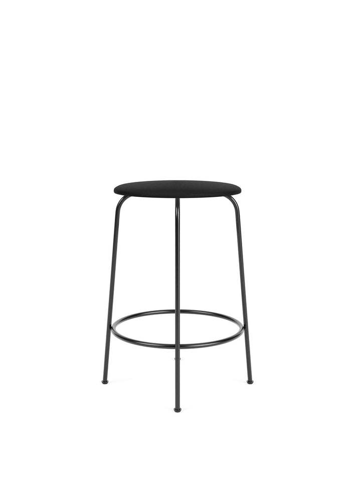 Afteroom Counter Stool, Upholstered Seat by Audo Copenhagen - Effortlessly blend style and comfort with the Afteroom Counter Stool. Crafted with clean lines and a sturdy steel base, this stool adds durability to any space. Customize the upholstery and cho