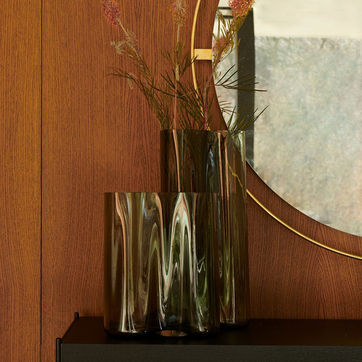 AUDO CPH (ex MENU) Aer Vase, H33cm in Smoke by Audo Copenhagen - Experience pure sophistication and absolute beauty with the AUDO CPH (ex MENU) Aer Vase, H33cm in Smoke. This stunning piece is inspired by the spiraling movement of air and is available in