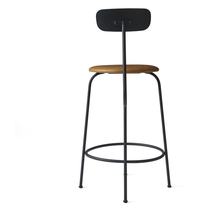 Afteroom Counter Chair by Audo Copenhagen - Experience sophistication with the Afteroom Counter Chair. This highly praised chair, created by Afteroom, boasts a stable fourth leg and streamlined design that effortlessly blends style and functionality, prov