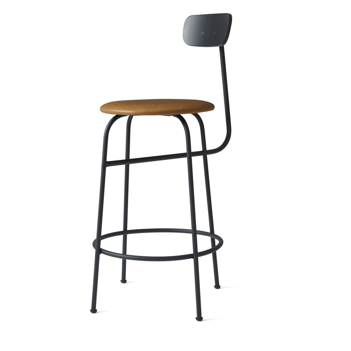 Afteroom Counter Chair by Audo Copenhagen - Experience sophistication with the Afteroom Counter Chair. This highly praised chair, created by Afteroom, boasts a stable fourth leg and streamlined design that effortlessly blends style and functionality, prov