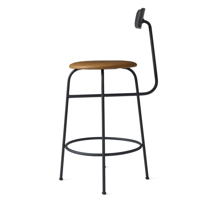 Afteroom Counter Chair by Audo Copenhagen - Experience sophistication with the Afteroom Counter Chair. This highly praised chair, created by Afteroom, boasts a stable fourth leg and streamlined design that effortlessly blends style and functionality, prov