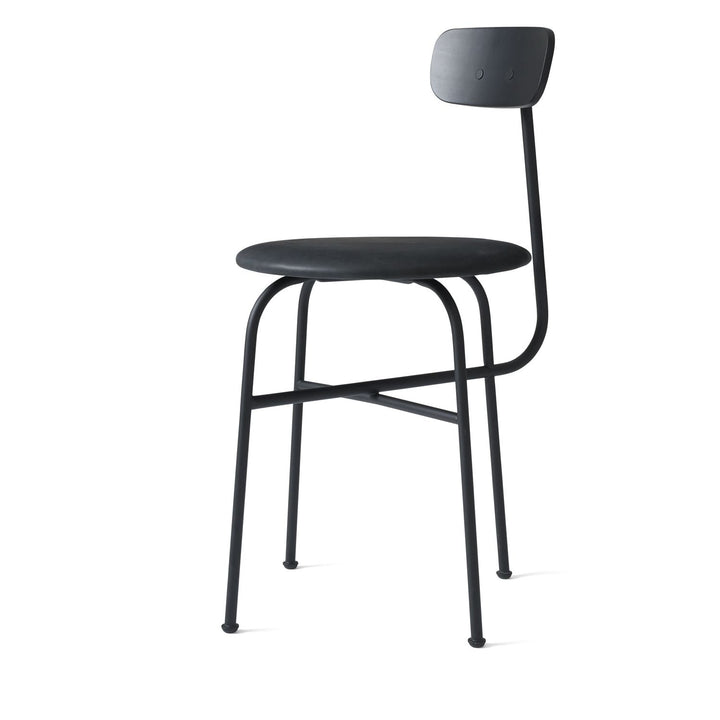 Afteroom Dining Chair by Audo Copenhagen - Expertly crafted with a sleek and recognizable silhouette, the Afteroom Dining Chair boasts a small oblong backrest that extends from a bent back rod for added support. Made with a tubular powder coated steel bas