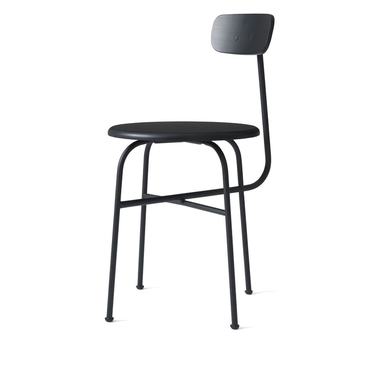 Afteroom Dining Chair by Audo Copenhagen - Expertly crafted with a sleek and recognizable silhouette, the Afteroom Dining Chair boasts a small oblong backrest that extends from a bent back rod for added support. Made with a tubular powder coated steel bas
