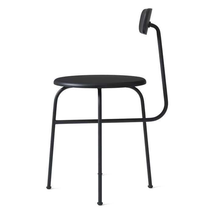 Afteroom Dining Chair by Audo Copenhagen - Expertly crafted with a sleek and recognizable silhouette, the Afteroom Dining Chair boasts a small oblong backrest that extends from a bent back rod for added support. Made with a tubular powder coated steel bas
