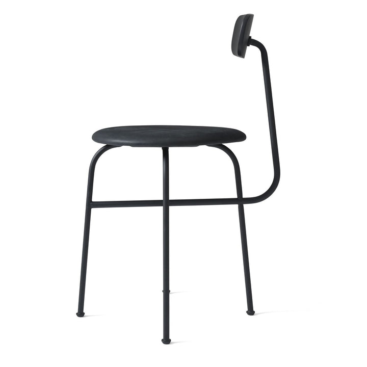 Afteroom Dining Chair by Audo Copenhagen - Expertly crafted with a sleek and recognizable silhouette, the Afteroom Dining Chair boasts a small oblong backrest that extends from a bent back rod for added support. Made with a tubular powder coated steel bas