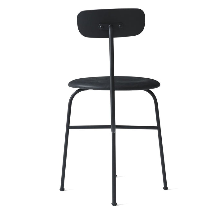 Afteroom Dining Chair by Audo Copenhagen - Expertly crafted with a sleek and recognizable silhouette, the Afteroom Dining Chair boasts a small oblong backrest that extends from a bent back rod for added support. Made with a tubular powder coated steel bas