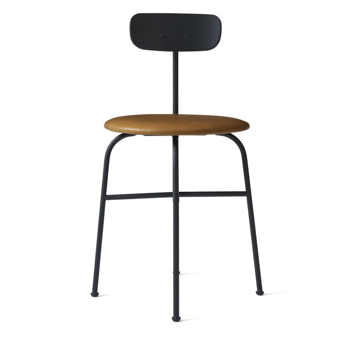 Afteroom Dining Chair by Audo Copenhagen - Expertly crafted with a sleek and recognizable silhouette, the Afteroom Dining Chair boasts a small oblong backrest that extends from a bent back rod for added support. Made with a tubular powder coated steel bas