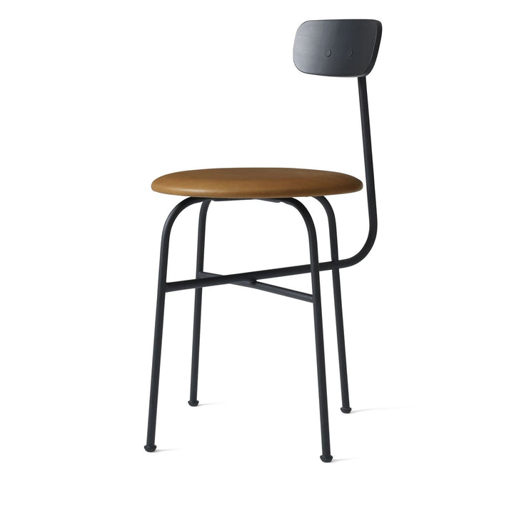 Afteroom Dining Chair by Audo Copenhagen - Expertly crafted with a sleek and recognizable silhouette, the Afteroom Dining Chair boasts a small oblong backrest that extends from a bent back rod for added support. Made with a tubular powder coated steel bas