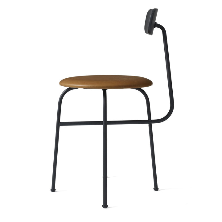 Afteroom Dining Chair by Audo Copenhagen - Expertly crafted with a sleek and recognizable silhouette, the Afteroom Dining Chair boasts a small oblong backrest that extends from a bent back rod for added support. Made with a tubular powder coated steel bas