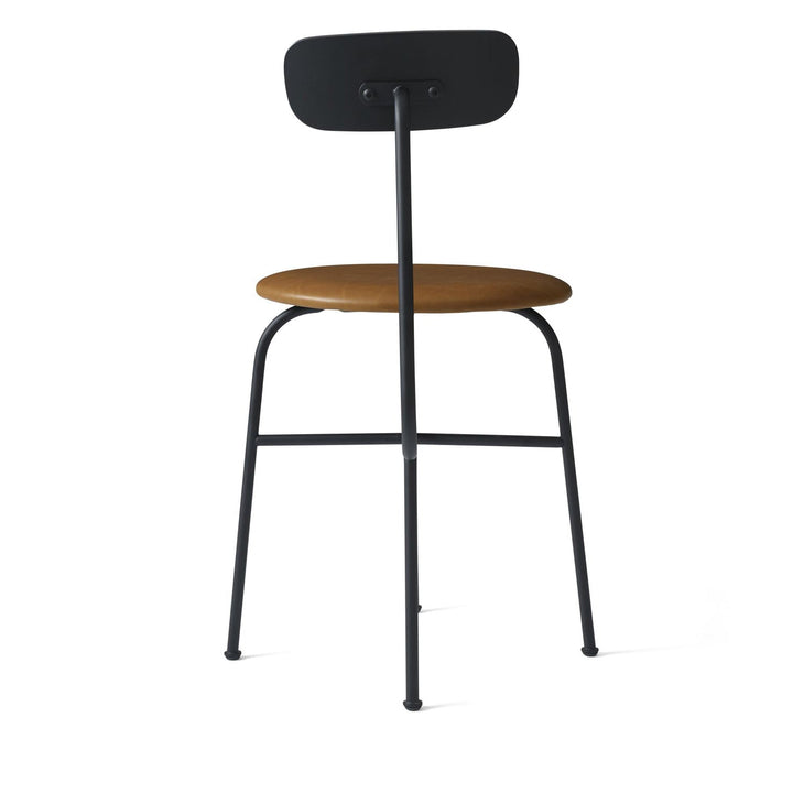 Afteroom Dining Chair by Audo Copenhagen - Expertly crafted with a sleek and recognizable silhouette, the Afteroom Dining Chair boasts a small oblong backrest that extends from a bent back rod for added support. Made with a tubular powder coated steel bas