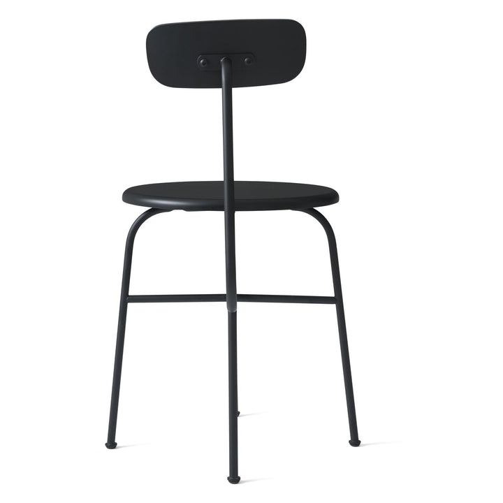 Afteroom Dining Chair by Audo Copenhagen - Expertly crafted with a sleek and recognizable silhouette, the Afteroom Dining Chair boasts a small oblong backrest that extends from a bent back rod for added support. Made with a tubular powder coated steel bas