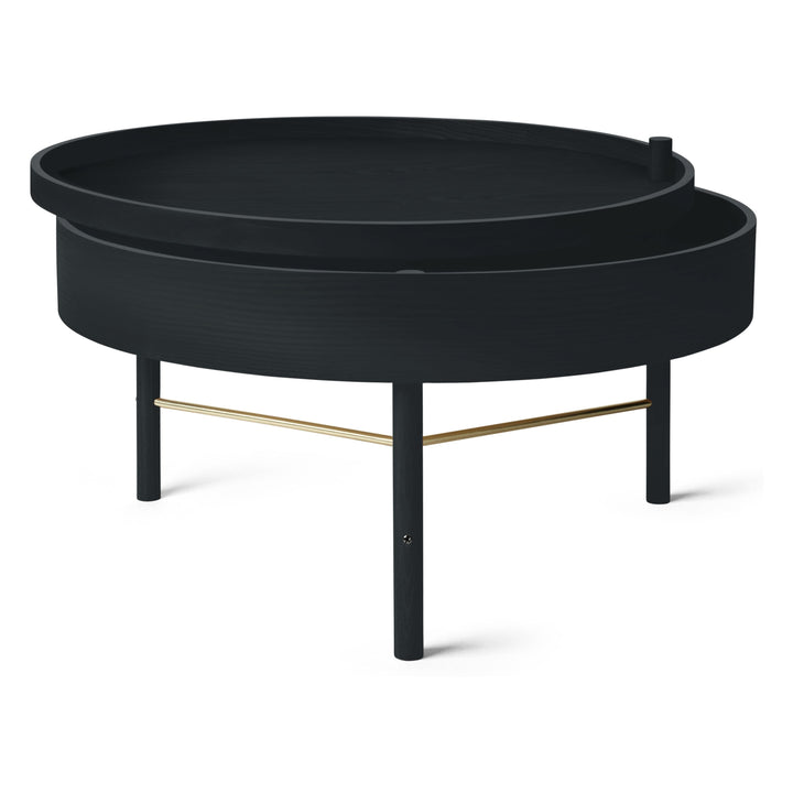 Turning Table by Audo Copenhagen - German designer Theresa Rand was experimenting with ways of combining a table and storage when she stumbled upon the idea of a lid that opens by rotating it around one of the legs. The result is elegant, unpretentious an