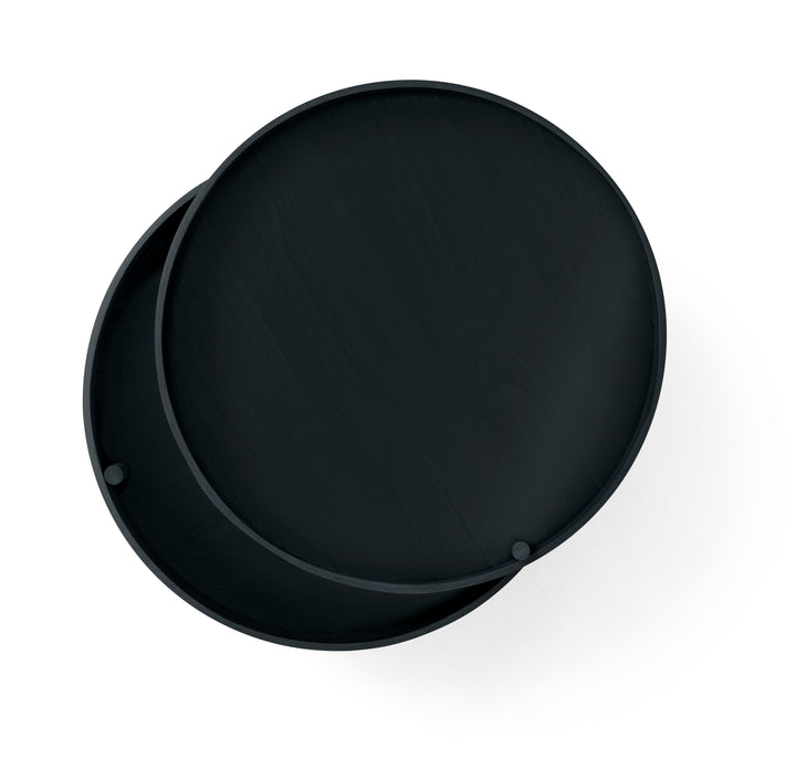 Turning Table by Audo Copenhagen - German designer Theresa Rand was experimenting with ways of combining a table and storage when she stumbled upon the idea of a lid that opens by rotating it around one of the legs. The result is elegant, unpretentious an