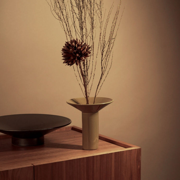 AUDO CPH (ex MENU) Hana Vase, H14.5cm, Ochre by Audo Copenhagen - Hana is inspired by ikebana, the ancient Japanese art of flower arranging that uses few but carefully chosen and artfully positioned stems. Shaped around a central ceramic flower frog, or k