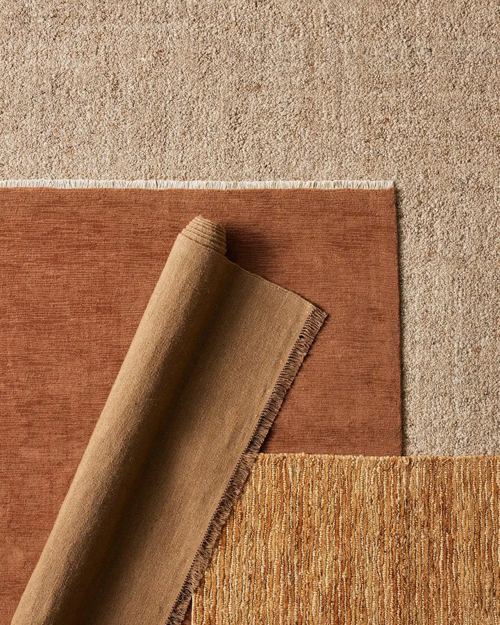 Bastian Natural - Handcrafted Jute Rug Bastian Natural offers a unique, durable jute rug combining artistry and craftsmanship for a rich tactile experience in your space.