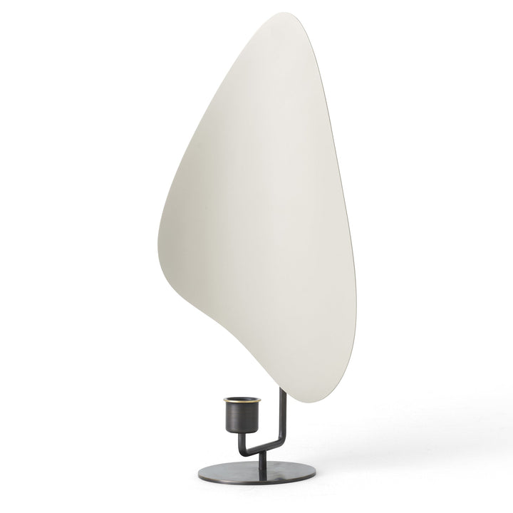 Flambeau Table Candle Holder by Audo Copenhagen - Inspired by French modernist lighting fixtures and designed to resemble a flickering flame, Flambeau is a sculptural design with playful presence. The metal backplate magnifies and reflects candlelight to