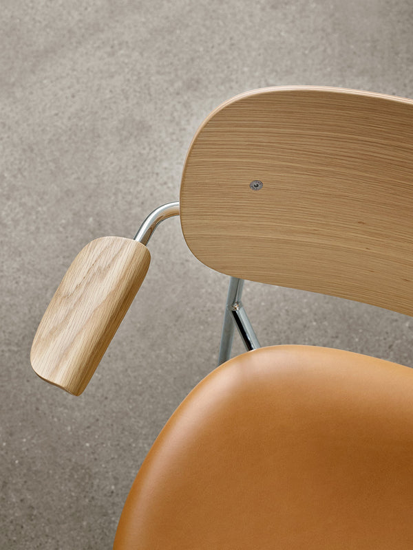 Co Dining Chair, upholstered seat with armrest, Chrome by Audo Copenhagen - Inspired by The Office Group's deep understanding of workplace requirements, the Co Chair embodies a perfect fusion of lightweight elegance and exceptional seating comfort. Additi