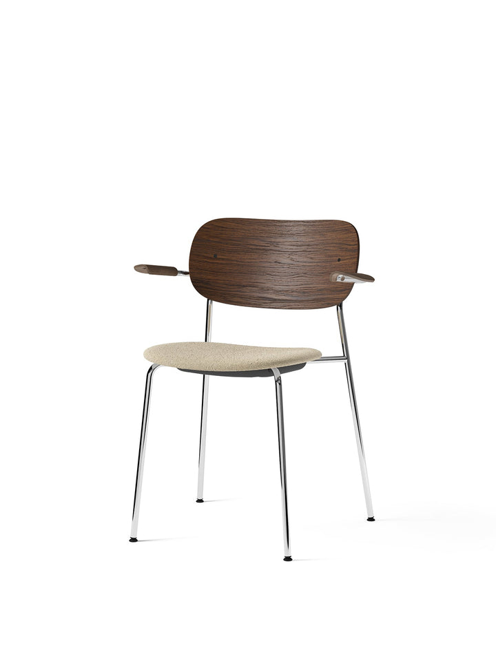 Co Dining Chair, upholstered seat with armrest, Chrome by Audo Copenhagen - Inspired by The Office Group's deep understanding of workplace requirements, the Co Chair embodies a perfect fusion of lightweight elegance and exceptional seating comfort. Additi