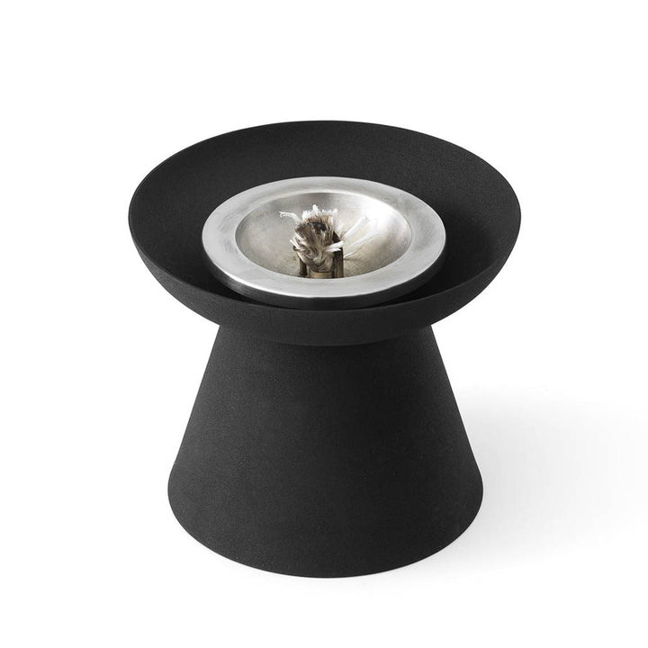 AUDO CPH (ex MENU) Meira Oil Lantern, Black, H13.5cm by Audo Copenhagen - Inspired by ancient torches, the Meira Oil Lantern in powder-coated steel illuminates outdoor spaces as the sun sets. Designed with a refillable oil chamber, the ambient design emit