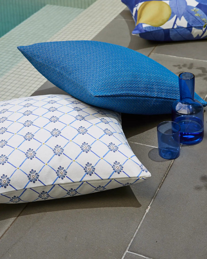 Elba Ocean Inspired by handmade tiles found on the Mediterranean coast, Elba Ocean offers a hand-painted watercolour geometric motif with touches of floral components. The small-scale design is available in two colourways that are perfect for summer. The
