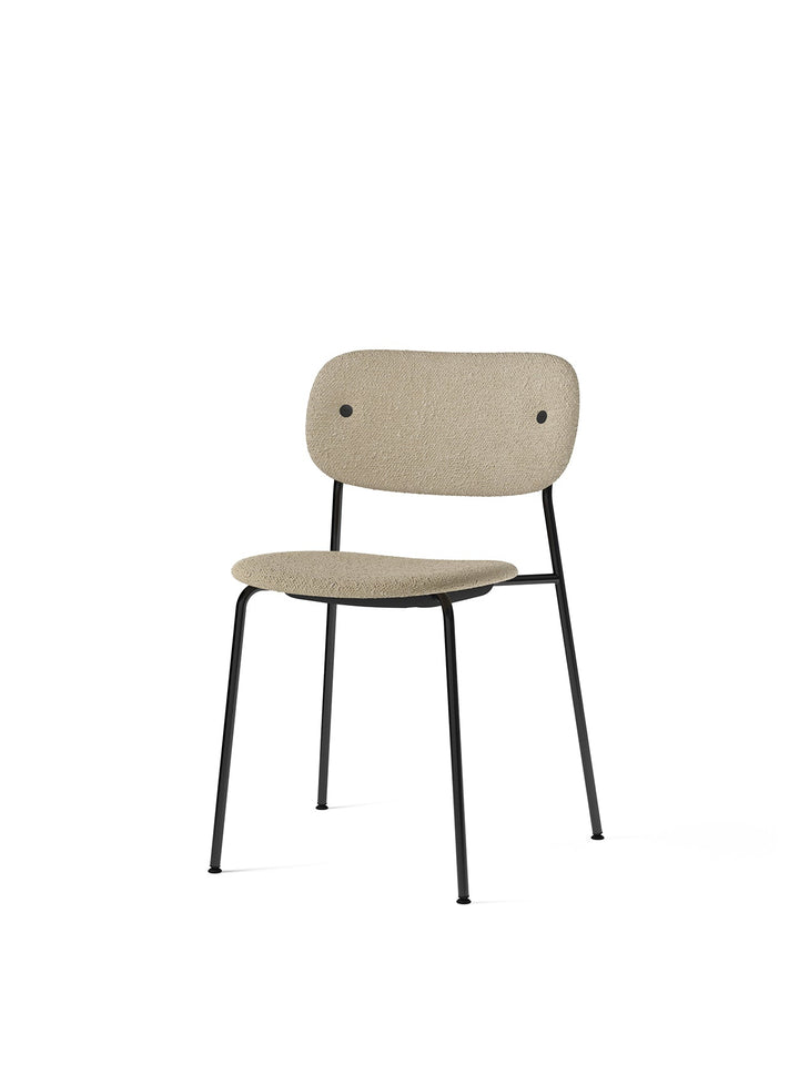 Co Dining Chair, fully upholstered, Black by Audo Copenhagen - Introducing the Co Dining Chair, a perfect blend of style and comfort. With its lightweight and streamlined profile, this chair offers an exceptional seating experience. Choose from options wi