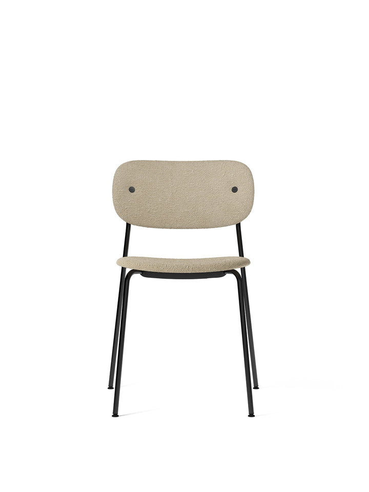 Co Dining Chair, fully upholstered, Black by Audo Copenhagen - Introducing the Co Dining Chair, a perfect blend of style and comfort. With its lightweight and streamlined profile, this chair offers an exceptional seating experience. Choose from options wi
