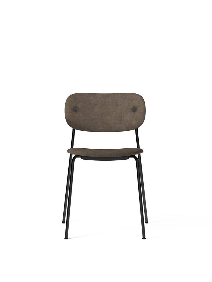 Co Dining Chair, fully upholstered, Black by Audo Copenhagen - Introducing the Co Dining Chair, a perfect blend of style and comfort. With its lightweight and streamlined profile, this chair offers an exceptional seating experience. Choose from options wi