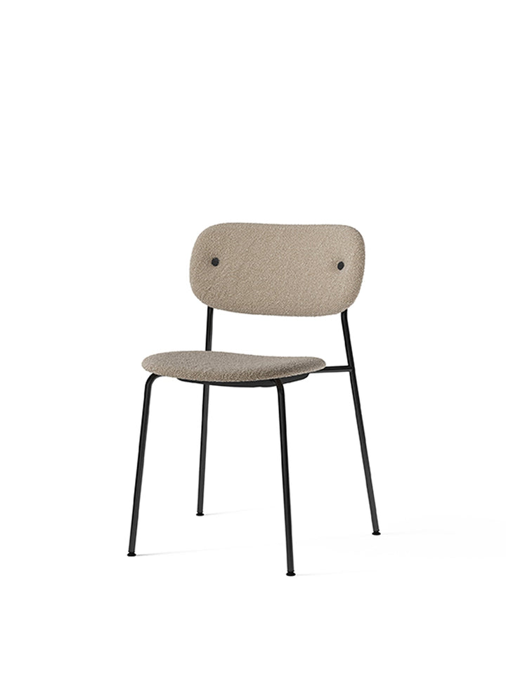 Co Dining Chair, fully upholstered, Black by Audo Copenhagen - Introducing the Co Dining Chair, a perfect blend of style and comfort. With its lightweight and streamlined profile, this chair offers an exceptional seating experience. Choose from options wi
