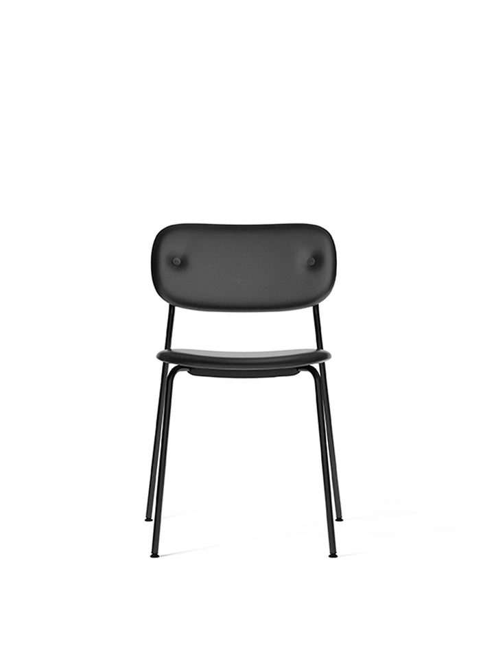 Co Dining Chair, fully upholstered, Black by Audo Copenhagen - Introducing the Co Dining Chair, a perfect blend of style and comfort. With its lightweight and streamlined profile, this chair offers an exceptional seating experience. Choose from options wi