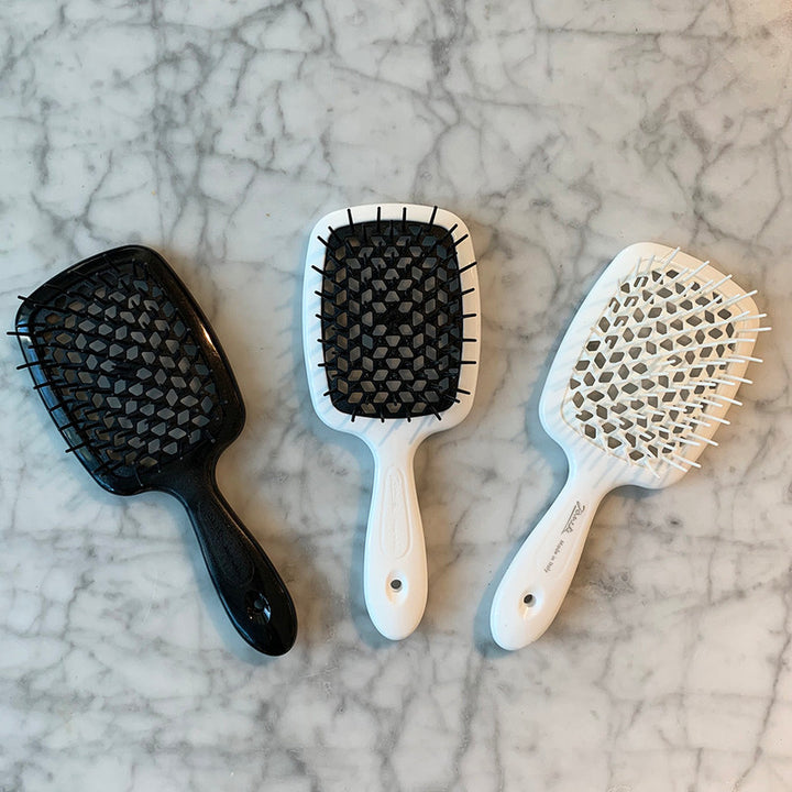 Janake Super Brush ( Multi Colours ) | Australian Stockist Introducing the Superbrush by Janake Italy. This wet-to-dry styling brush is a patented cult favourite, renowned for its effectiveness and popularity. As a professional haircare tool, the Janake S