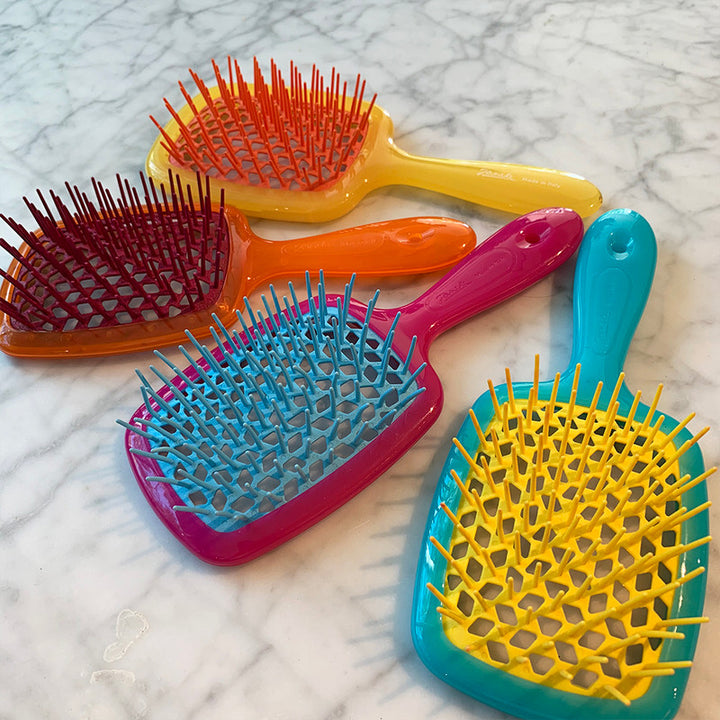 Janake Super Brush ( Multi Colours ) | Australian Stockist Introducing the Superbrush by Janake Italy. This wet-to-dry styling brush is a patented cult favourite, renowned for its effectiveness and popularity. As a professional haircare tool, the Janake S