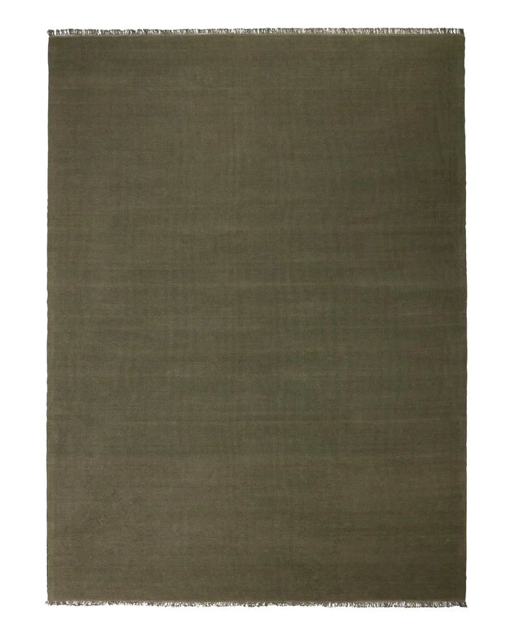 Emilio Kale - Premium Flat-Weave Linen Rug Transform your space with the Emilio Kale rug. Its deep forest green hue and fringe details offer effortless sophistication.