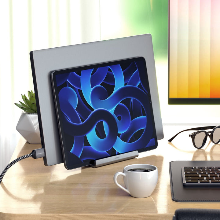 Satechi Dual Vertical Laptop Stand Keep your workstation tidy and every device within reach with Satechi Dual Vertical Stand for laptops and tablets. The 2-in-1 design supports your Macbook and iPad vertically at the same time, improving your working effi