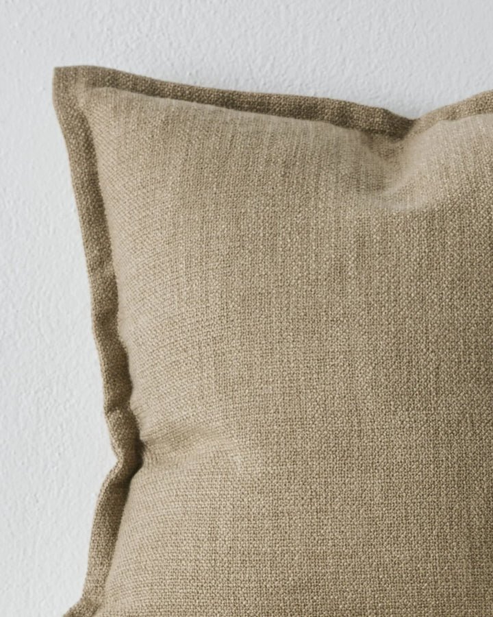 Figlio Fossil Expertly crafted to resemble a chunky woven linen, the Figlio cushion exudes a natural charm that seamlessly blends with any décor style.The Fossil colourway of Figlio is a light taupe that adds a touch of refinement while maintaining a cosy
