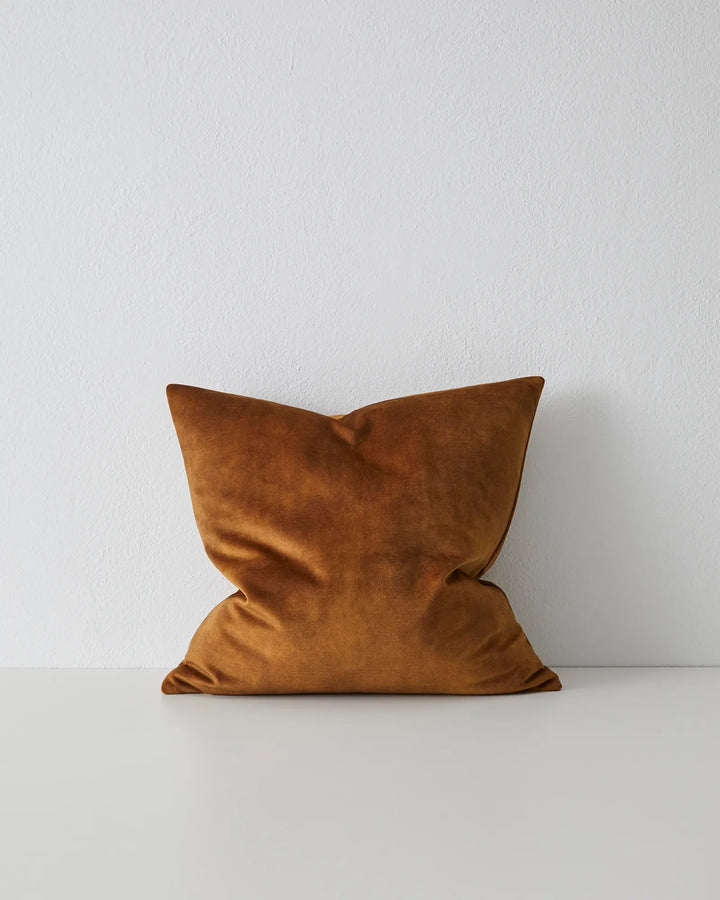 Ava Ochre: Luxurious Velvet Cushion Discover the Ava Ochre cushion in rich burnt orange, perfect for autumn themes. Soft, low maintenance, and available in over 20 colors!