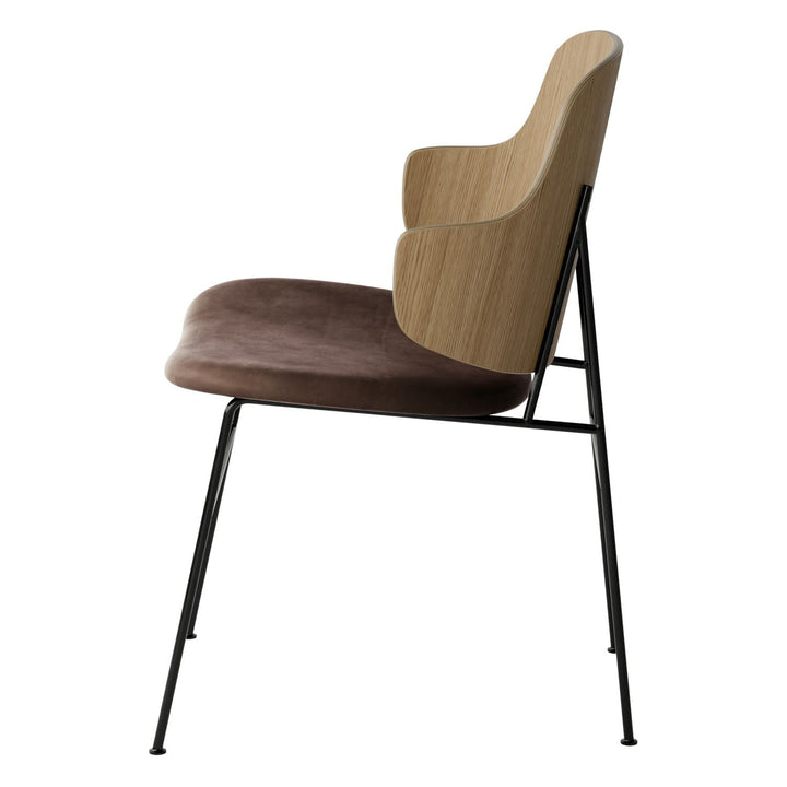 The Penguin Timber Dining Chair by Audo Copenhagen - Light, elegant, sculptural and artistic, the Penguin Dining Chair is a rare Danish Modern icon designed by Danish furniture designer Ib Kofod-Larsen in 1953. When it was launched in the United States, t