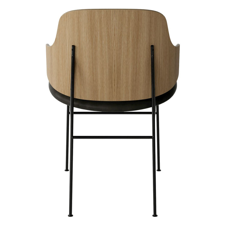 The Penguin Timber Dining Chair by Audo Copenhagen - Light, elegant, sculptural and artistic, the Penguin Dining Chair is a rare Danish Modern icon designed by Danish furniture designer Ib Kofod-Larsen in 1953. When it was launched in the United States, t