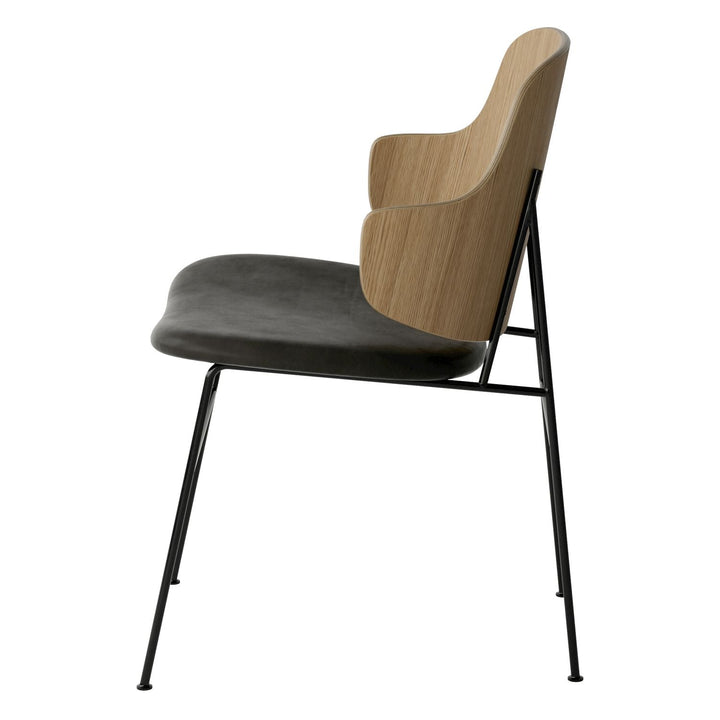 The Penguin Timber Dining Chair by Audo Copenhagen - Light, elegant, sculptural and artistic, the Penguin Dining Chair is a rare Danish Modern icon designed by Danish furniture designer Ib Kofod-Larsen in 1953. When it was launched in the United States, t