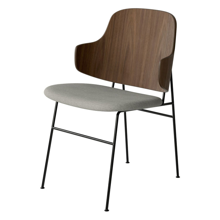 The Penguin Timber Dining Chair by Audo Copenhagen - Light, elegant, sculptural and artistic, the Penguin Dining Chair is a rare Danish Modern icon designed by Danish furniture designer Ib Kofod-Larsen in 1953. When it was launched in the United States, t