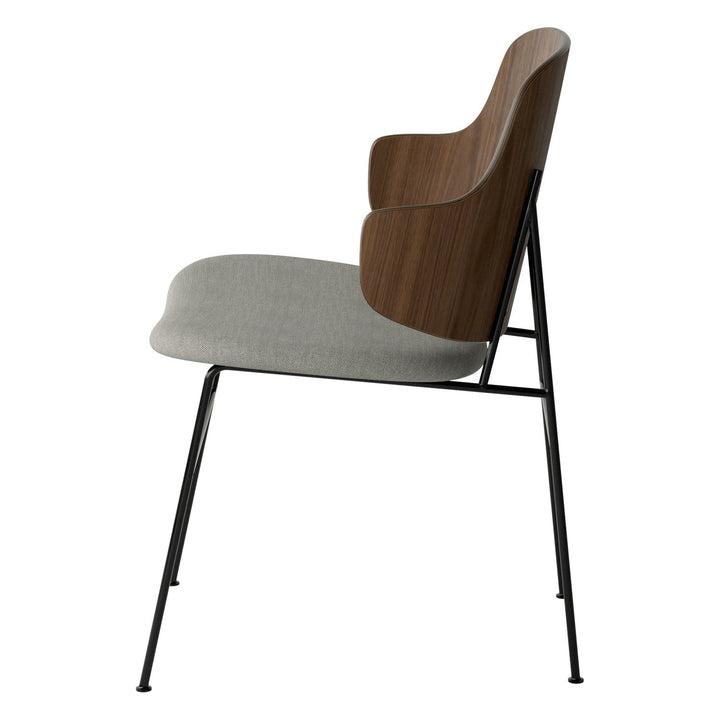 The Penguin Timber Dining Chair by Audo Copenhagen - Light, elegant, sculptural and artistic, the Penguin Dining Chair is a rare Danish Modern icon designed by Danish furniture designer Ib Kofod-Larsen in 1953. When it was launched in the United States, t