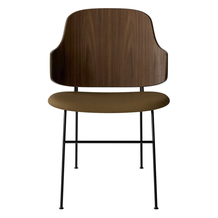 The Penguin Timber Dining Chair by Audo Copenhagen - Light, elegant, sculptural and artistic, the Penguin Dining Chair is a rare Danish Modern icon designed by Danish furniture designer Ib Kofod-Larsen in 1953. When it was launched in the United States, t