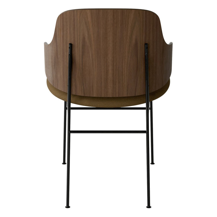 The Penguin Timber Dining Chair by Audo Copenhagen - Light, elegant, sculptural and artistic, the Penguin Dining Chair is a rare Danish Modern icon designed by Danish furniture designer Ib Kofod-Larsen in 1953. When it was launched in the United States, t