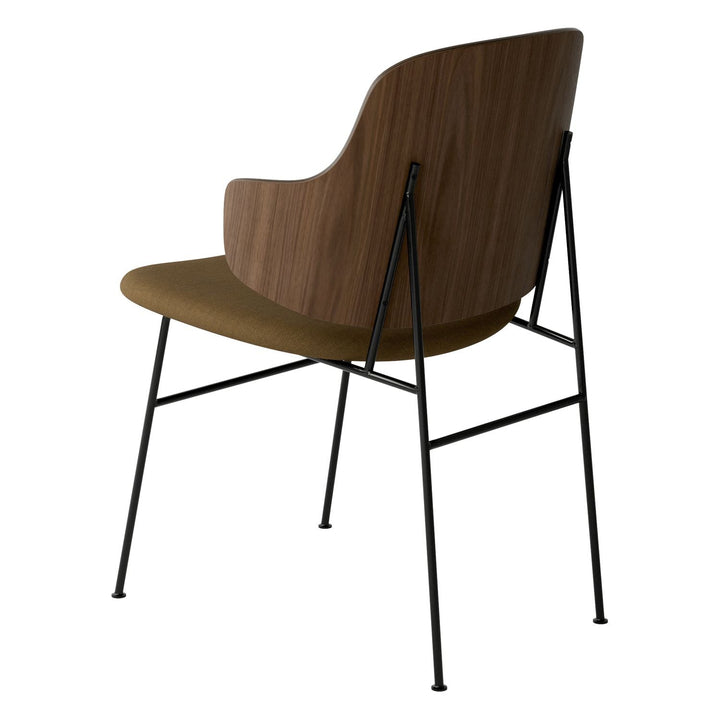 The Penguin Timber Dining Chair by Audo Copenhagen - Light, elegant, sculptural and artistic, the Penguin Dining Chair is a rare Danish Modern icon designed by Danish furniture designer Ib Kofod-Larsen in 1953. When it was launched in the United States, t