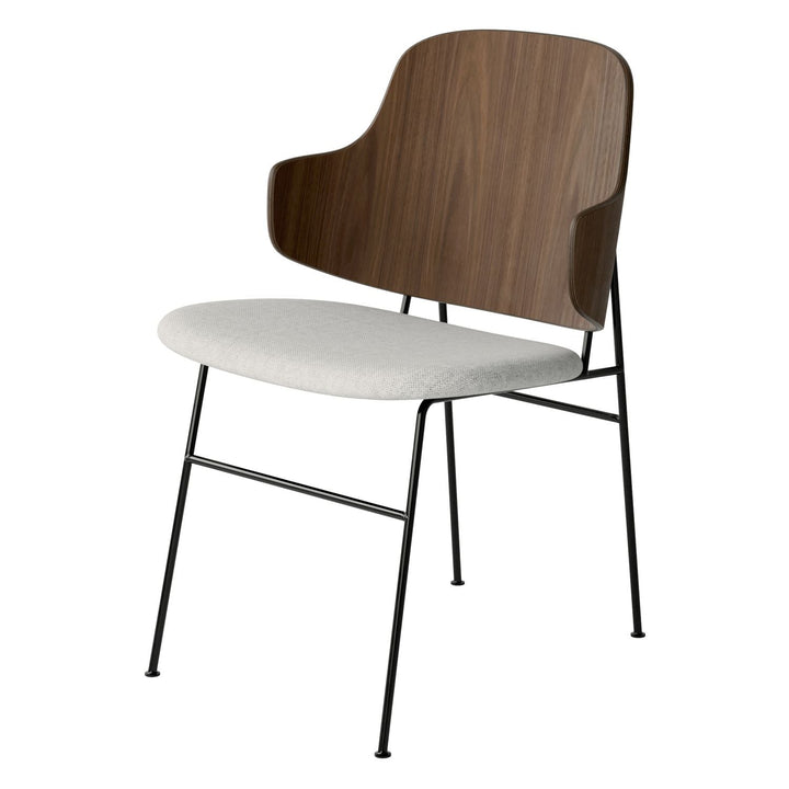 The Penguin Timber Dining Chair by Audo Copenhagen - Light, elegant, sculptural and artistic, the Penguin Dining Chair is a rare Danish Modern icon designed by Danish furniture designer Ib Kofod-Larsen in 1953. When it was launched in the United States, t