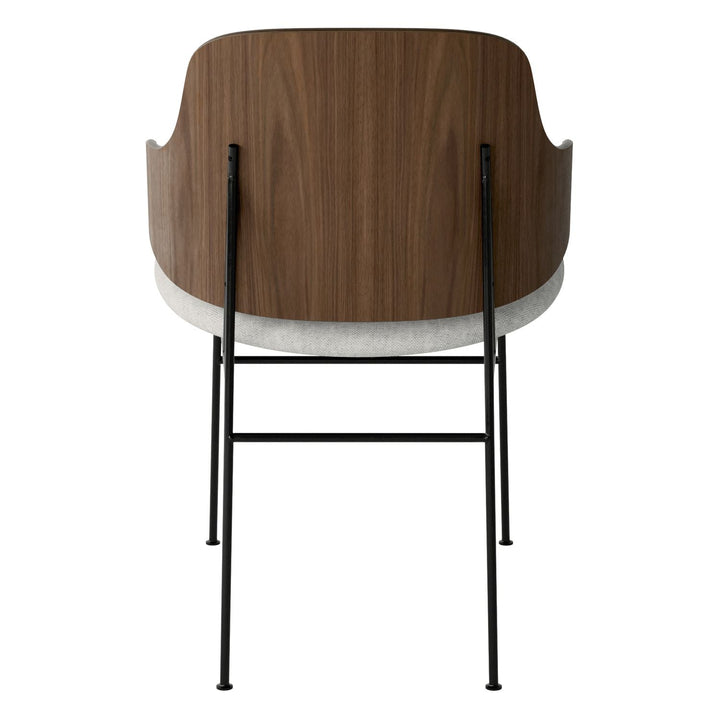 The Penguin Timber Dining Chair by Audo Copenhagen - Light, elegant, sculptural and artistic, the Penguin Dining Chair is a rare Danish Modern icon designed by Danish furniture designer Ib Kofod-Larsen in 1953. When it was launched in the United States, t