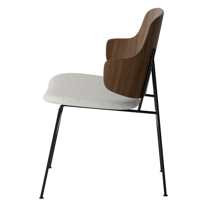 The Penguin Timber Dining Chair by Audo Copenhagen - Light, elegant, sculptural and artistic, the Penguin Dining Chair is a rare Danish Modern icon designed by Danish furniture designer Ib Kofod-Larsen in 1953. When it was launched in the United States, t
