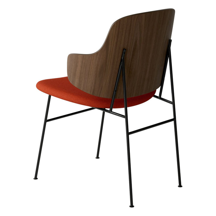 The Penguin Timber Dining Chair by Audo Copenhagen - Light, elegant, sculptural and artistic, the Penguin Dining Chair is a rare Danish Modern icon designed by Danish furniture designer Ib Kofod-Larsen in 1953. When it was launched in the United States, t