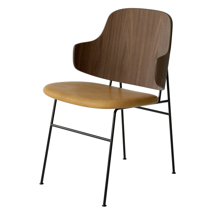 The Penguin Timber Dining Chair by Audo Copenhagen - Light, elegant, sculptural and artistic, the Penguin Dining Chair is a rare Danish Modern icon designed by Danish furniture designer Ib Kofod-Larsen in 1953. When it was launched in the United States, t